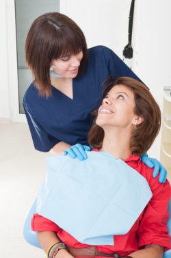 Dentist woman taking good care on her patient sedation dentistry asheville nc